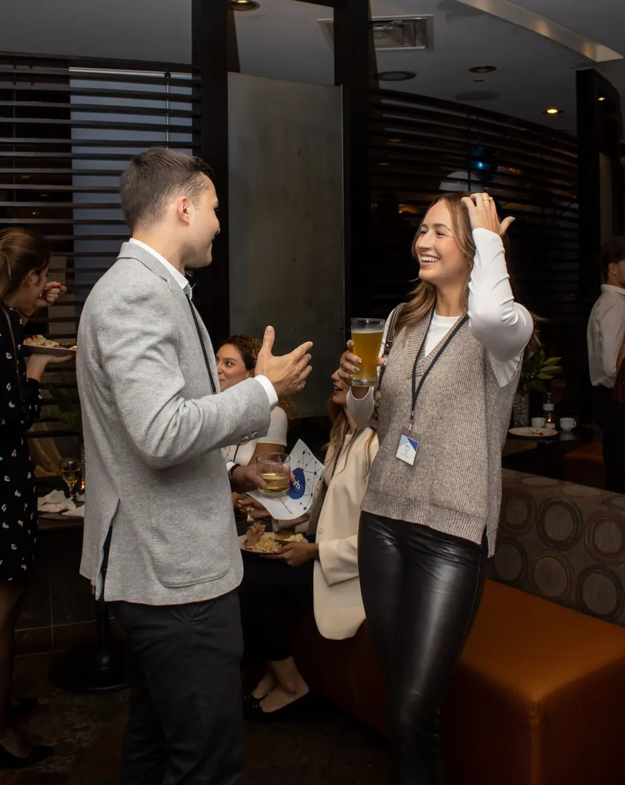Two guests talking at a SerbLink meetup